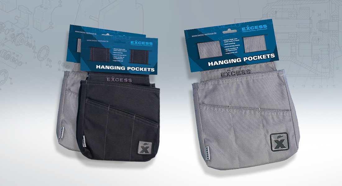 Zwei Paar Werkzeugtaschen der Marke Excess Professional Workwear in Schwarz und Grau, verpackt mit blauen Kartonaufhängern und der Aufschrift „Hanging Pockets“.