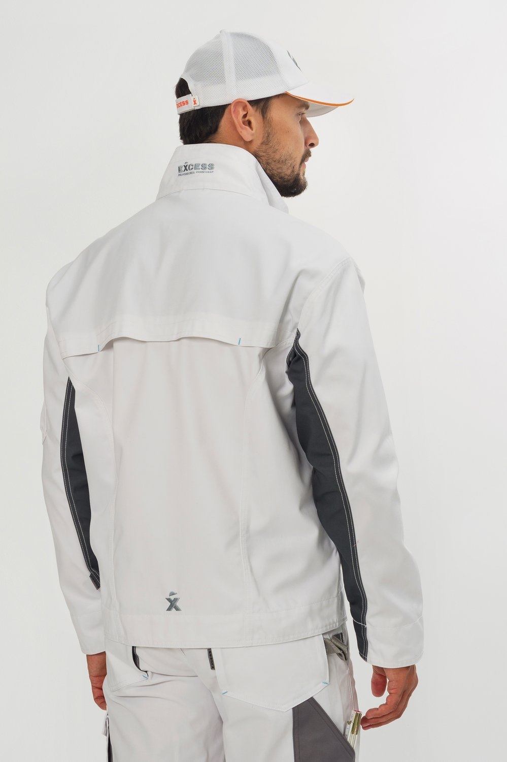 Rückansicht der weißen CHAMP Arbeitsjacke – Sportliche Arbeitsjacke mit verdecktem Reißverschluss und vielen praktischen Taschen.