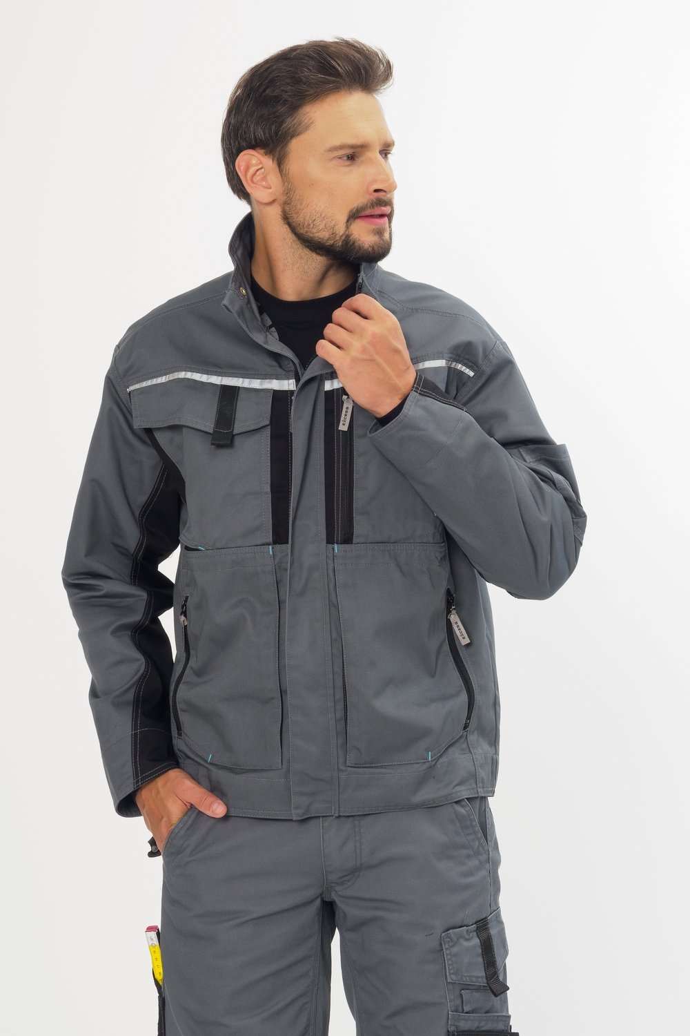 Graue CHAMP Arbeitsjacke – Sportliche Arbeitsjacke mit verdecktem Reißverschluss und vielen praktischen Taschen.